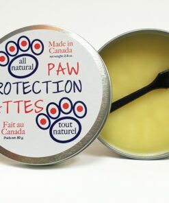 All natural paw protection balm for pets, made in Canada. Open 80 g tin with applicator.