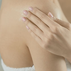 oils application on the shoulder.