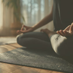 Meditating yoga position.